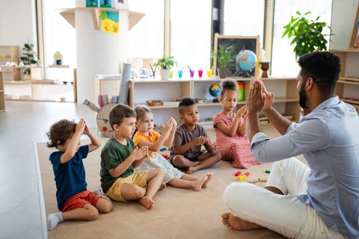 church nursery floor with kids and teacher