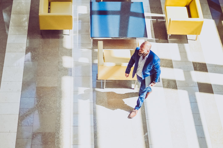 businessman walking through an office